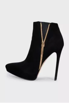 Black suede ankle boots with heels and embellishments
