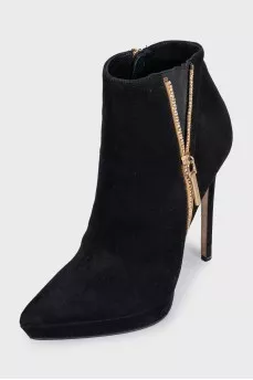 Black suede ankle boots with heels and embellishments