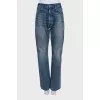 Mid-rise distressed jeans