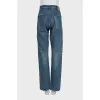 Mid-rise distressed jeans