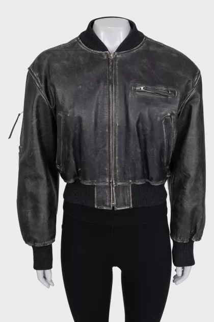 Insulated leather jacket with a distressed effect