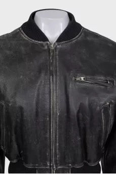 Insulated leather jacket with a distressed effect