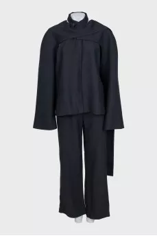 Black suit with trousers, top and cape