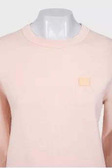 Pink sweatshirt with logo patch