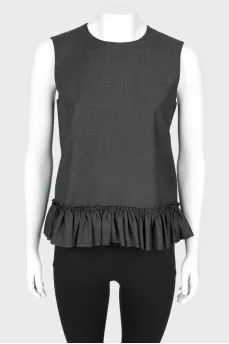 Ruffled blouse with tag