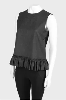 Ruffled blouse with tag