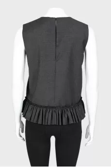 Ruffled blouse with tag