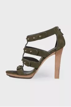 Suede sandals with wooden heels.