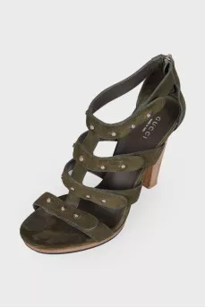 Suede sandals with wooden heels.