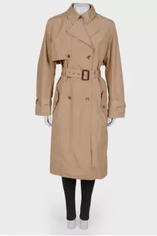 Double-breasted trench coat with a belt