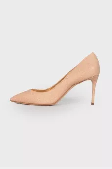 Peach shoes with a shiny coating