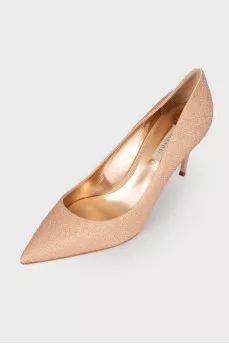 Peach shoes with a shiny coating
