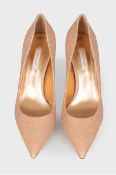 Peach shoes with a shiny coating