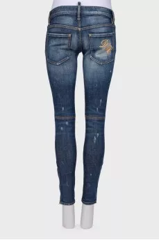 Jeans with decorative scuffs