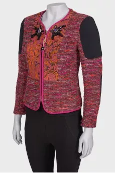 Tweed jacket with symmetrical applications