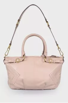 Perforated leather bag