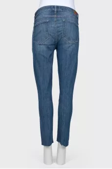 Jeans with decorative cuts