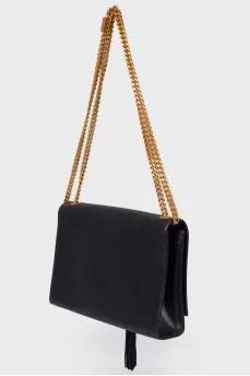 Leather bag with tassel