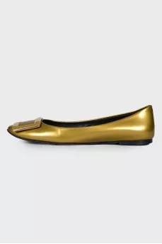 Gold leather ballerinas