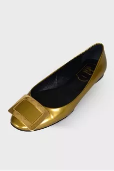 Gold leather ballerinas