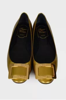 Gold leather ballerinas