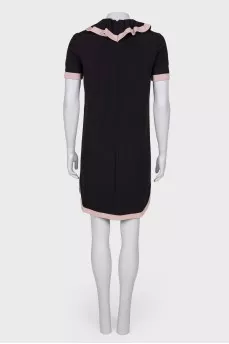 Black and pink dress with ruffles on the chest