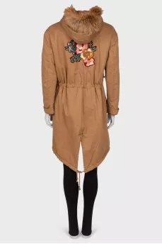 Parka with appliqué back
