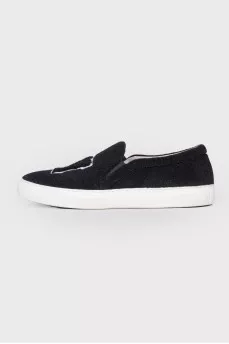 Black slip-ons in soft textile