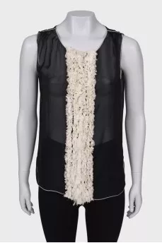 Sleeveless translucent blouse