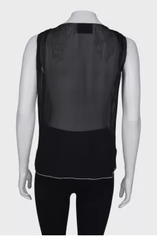 Sleeveless translucent blouse