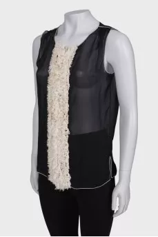 Sleeveless translucent blouse