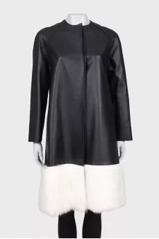 Leather coat with white fur on the hem