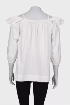 White blouse with ruffled sleeves