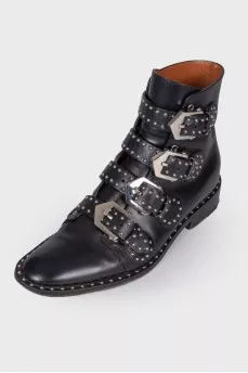 Black leather boots with straps