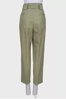 Green trousers with belt