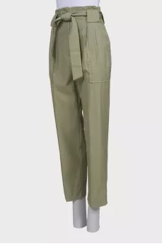 Green trousers with belt