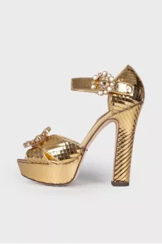 Golden sandals with rhinestones