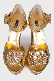 Golden sandals with rhinestones