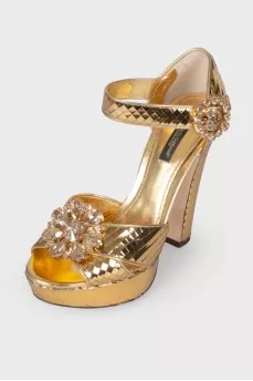 Golden sandals with rhinestones