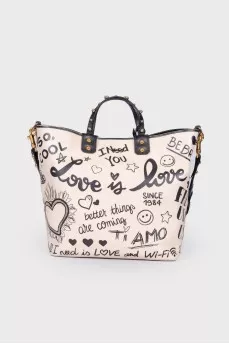 Beatrice Mural bag with tag