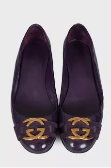 Purple patent ballerina shoes