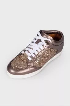 Sneakers with gold sequins