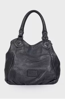 Leather bag with brand logo
