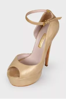 Golden high heels