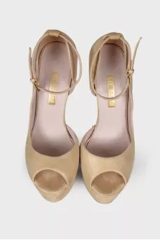 Golden high heels