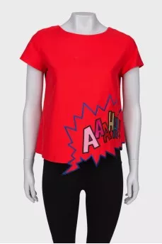 Red blouse with a patch at the bottom