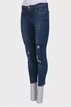 Light blue distressed jeans