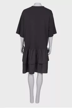 Dress with ruffles at the hem