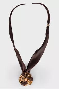 Textile and silver necklace