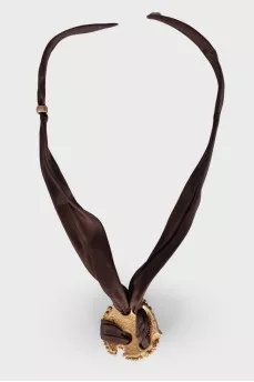 Textile and silver necklace